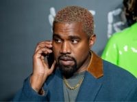 NEW YORK, NEW YORK - DECEMBER 02: Kanye West attends the the Versace fall 2019 fashion show at the American Stock Exchange Building in lower Manhattan on December 02, 2018 in New York City. (Photo by Roy Rochlin/Getty Images)