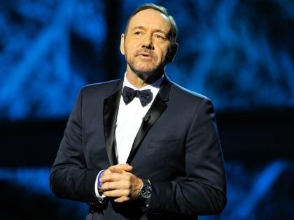 MOUNTAIN VIEW, CA - DECEMBER 12: Kevin Spacey hosts the 2014 Breakthrough Prizes Awarded in Fundamental Physics and Life Sciences Ceremony at NASA Ames Research Center on December 12, 2013 in Mountain View, California. (Photo by Steve Jennings/Getty Images for MerchantCantos)