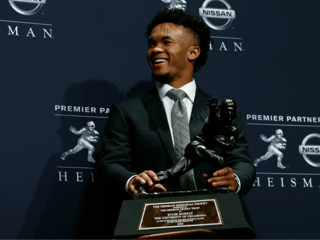 Kyler Murray of Oklahoma poses for a photo after winning the 2018 Heisman Trophy on Decemb