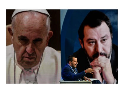 Italys Interior Minister and Deputy Prime Minister Matteo Salvini gestures as he speaks during the Italian talk show 'Porta a Porta', broadcast on Italian channel Rai 1, in Rome, on June 20, 2018, as a picture of Pope Francis is seen in the background. (Photo by Andreas SOLARO / AFP) …