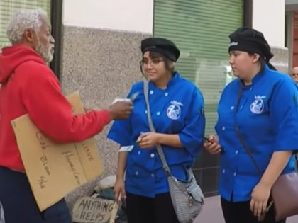 A homeless man, Moses Elder, handed out $100 bills to those who stopped to pay attention to him. Elder had help from an anonymous billionaire Secret Santa, who instructed him to give away $3,000 to people who deserved it.