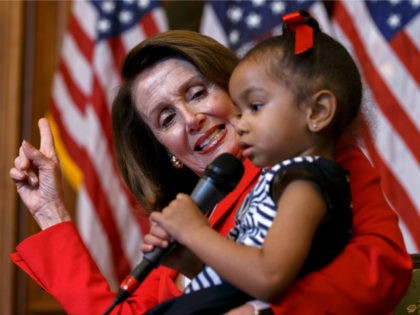 House Minority Leader Nancy Pelosi (D-CA) sings the 'ABC song' with a child during her weekly press conference on 'Take our Daughters and Sons to Work Day' at the Capitol on April 26, 2018 in Washington, DC. Pelosi answered questions ranging from how she started in politics and what she …