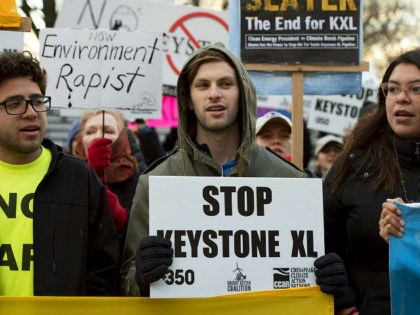 Opponents of the Keystone XL and Dakota Access pipelines hold a rally as they protest US President Donald Trump's executive orders advancing their construction, at Lafayette Park next to the White House in Washington, DC, on January 24, 2017. US President Donald Trump signed executive orders Tuesday reviving the construction …