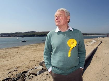 ROCK, ENGLAND - APRIL 13: Former Liberal Democrat leader Paddy Ashdown looks out to sea as he campaigns with Dan Rogerson, Liberal Democrat candidate for North Cornwall, on April 13, 2010 in Rock, England. The South West of England, where Lord Ashdown is heading the Liberal Democrats campaign, is traditionally …