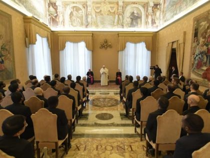 Pope Francis addresses Jesuits in the Vatican.