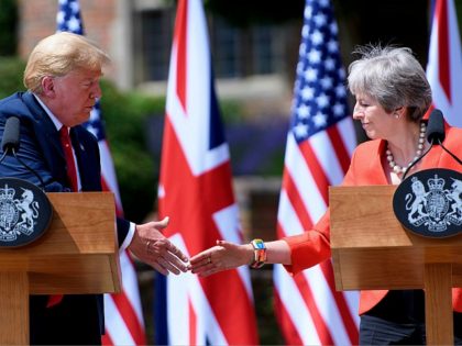 US President Donald Trump (L) and Britain's Prime Minister Theresa May shake hands during a joint press conference following their meeting at Chequers, the prime minister's country residence, near Ellesborough, northwest of London on July 13, 2018 on the second day of Trump's UK visit. - Britain and the United …