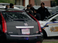 Robbery Suspect's SUV Robbery suspect's SUV with three bullet holes fired by robbery victim. (Photo: KTRK Video Screenshot)