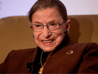 In this Dec. 17, 2013 file photo, Supreme Court Justice Ruth Bader Ginsburg smiles while s