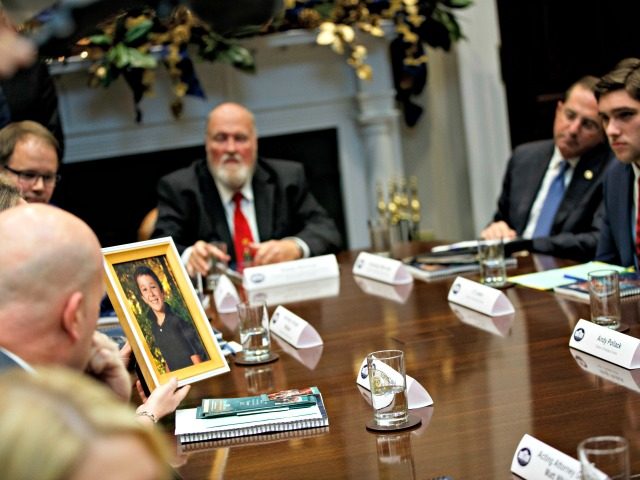 Scarlett Lewis holds up a photo of her son Jesse Lewis, who was killed in the Sandy Hook s