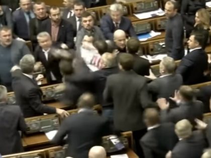 Ukrainian lawmakers broke out into a massive brawl Thursday during a parliamentary session, continuing a long-held tradition of throwing punches at each other over the issues of the day.