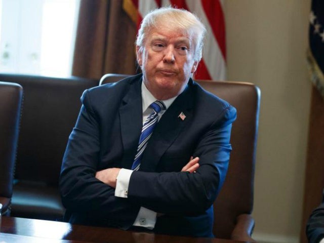In this March 8, 2018, file photo, President Donald Trump listens during a cabinet meeting at the White House in Washington. Trump is increasingly flying solo. With his staff hollowing out and his agenda struggling, Trump has eagerly seized opportunities to take bold action on his own. Always improvisational, the …