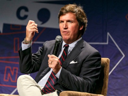 LOS ANGELES, CA - OCTOBER 21: Tucker Carlson speaks onstage during Politicon 2018 at Los Angeles Convention Center on October 21, 2018 in Los Angeles, California. (Photo by Rich Polk/Getty Images for Politicon )