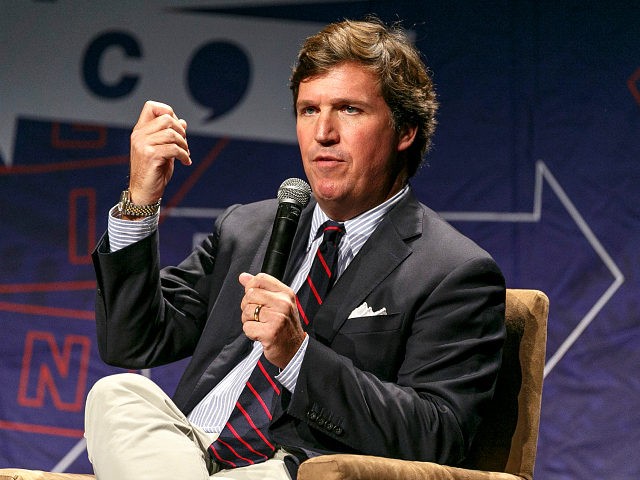 LOS ANGELES, CA - OCTOBER 21: Tucker Carlson speaks onstage during Politicon 2018 at Los A