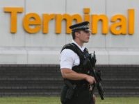 airport security LONDON - JULY 03: An armed police officer stands guard at Terminal 4, Heathrow Airport on July 3, 2007 in London, England. Officials at Heathrow Terminal 4 have confirmed they have a suspect bag which has caused major disruption to the travel network. (Photo by Daniel Berehulak/Getty Images)