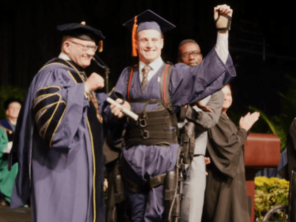 Aldo Amenta, who graduated from Florida International University (FIU), walked across the stage to fetch his diploma from school officials, thanks to a little support from an exoskeleton.