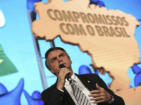 Brazil's Presidential pre-candidate and conservative lawmaker Jair Bolsonaro, speaks during a meeting of the "In Defense of Muncipalities" congress, in Brasilia, Brazil, Wednesday, May 23, 2018. (AP Photo/Eraldo Peres)