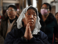 chinese christians china Catholic worshippers attend a mass on Holy Thursday, ahead of Easter celebrations, at Beijing's government-sanctioned South Cathedral in Beijing on March 29, 2018. A historic agreement between the Vatican and Beijing on the appointment of bishops in China could be signed as early as March 31, a Chinese government-approved bishop …