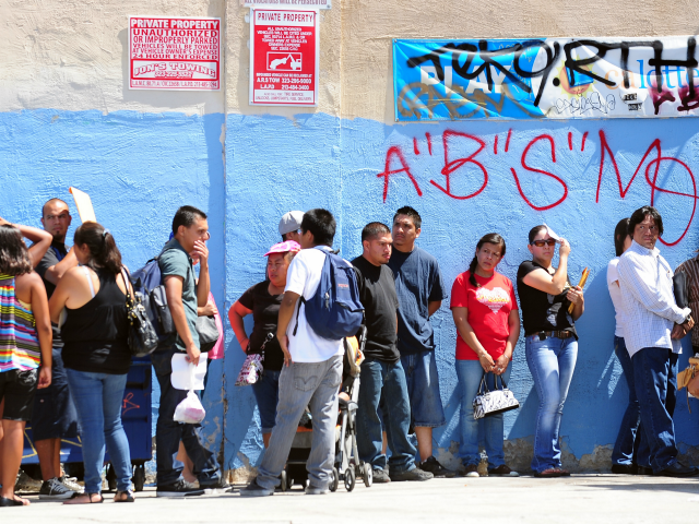 This August 15, 2012 file photo shows young people waiting in line to enter the Coalition for Humane Immigrant Rights of Los Angeles (CHIRLA) office in California, on the first day of the Deferred Action for Childhood Arrivals (DACA) program. Democratic US President Barack Obama failed on his promise of …
