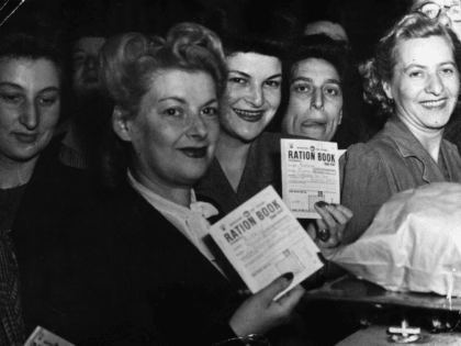 21st June 1946: Hungry housewives bring their ration books to London's Petticoat Lane Market during World War II on the first day of bread rationing. (Photo by Eric Harlow/Keystone/Getty Images)