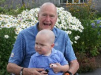 The United States Secret Service shared a touching photo Tuesday morning of the time former President George H.W. Bush— who shaved his head bald— posed for a picture with an agent's son whose head was also shaved after being diagnosed with leukemia.
