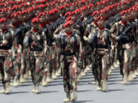 In this photo taken with slow shutter speed, members of the Indonesian Army Special Forces Commandos march during a parade marking the 72nd anniversary of the Indonesian Armed Forces in Cilegon, Banten, Indonesia, Thursday, Oct. 5, 2017. Indonesia's president has urged the military to stay out of politics and remain loyal to the government in an apparent rebuke to a series of outlandish statements from the country's top general. (AP Photo/Tatan Syuflana) In this photo taken with slow shutter speed, members of the Indonesian Army Special Forces Commandos march during a parade marking the 72nd anniversary of the Indonesian Armed Forces in Cilegon, Banten, Indonesia, Thursday, Oct. 5, 2017. Indonesia's president has urged the military to stay out of politics and remain …