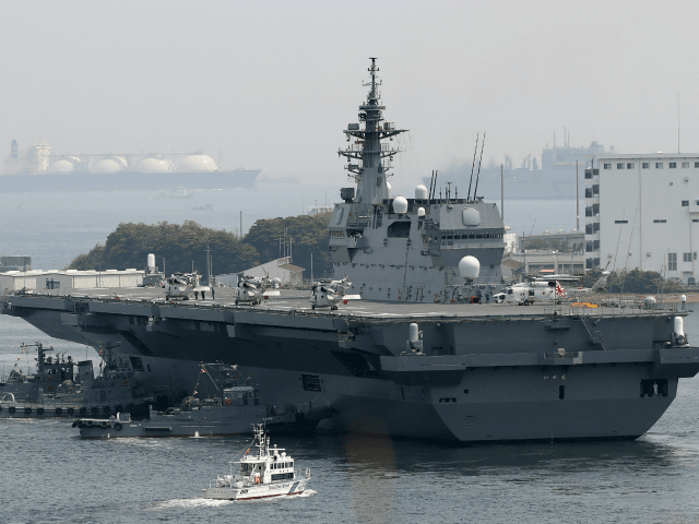 Japan's Maritime Self Defense Forces helicopter carrier Izumo sails out its Yokosuka Base
