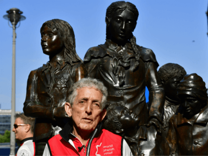 Israeli Paul Alexander poses at rail station 'Friedrichstrasse' before cycling from Berlin to London to commemorate the 80th anniversary of the 'Kindertransport' wartime rescue effort on June 17, 2018. - Paul Alexander was a 19-month-old toddler when his mother handed him to a volunteer nurse on a train leaving Nazi …