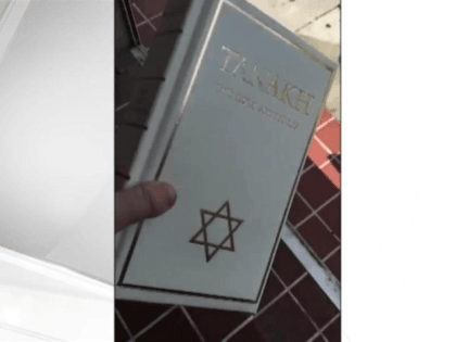 Miami police officer suspended after video emerges of him tossing Jewish bible