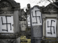 nazism Jewish tombstones are seen desecrated with swastikas in the Herrlisheim Jewish cemetery, north of Strasbourg, eastern France, Thursday, Dec. 13, 2018. Dozens of tombs were defaced were discovered Tuesday. (AP Photo/Jean-Francois Badias)