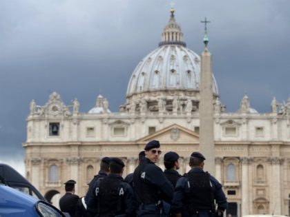 Italian police stand in front of St. Peter's basilica in the Vatican on March 27, 2015. AFP PHOTO / FILIPPO MONTEFORTE (Photo credit should read FILIPPO MONTEFORTE/AFP/Getty Images)
