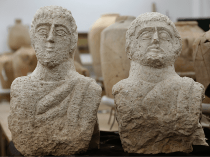 A picture taken at the Israel Antiquities Authority (IAA) laboratories in Jerusalem on December 30, 2018, shows a limestone busts that the IAA dated to the late Roman period, some 1,700 years ago. - An Israeli woman walking near ancient ruins noticed a head sticking out of the ground, leading …