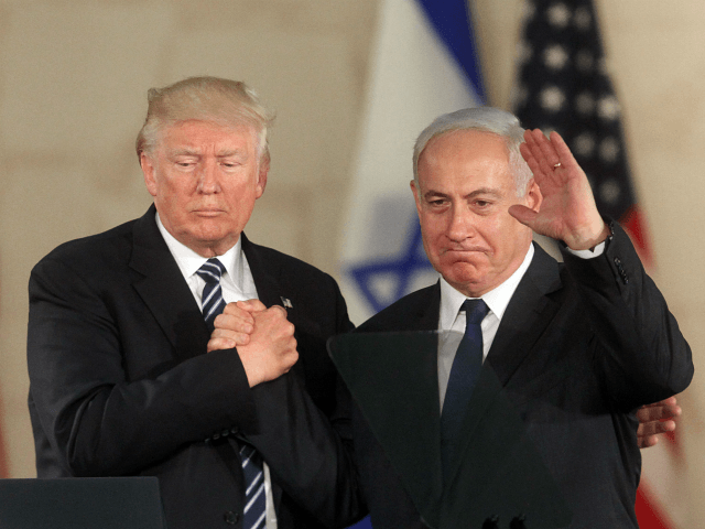 US President Donald Trump (L) and Israel's Prime Minister Benjamin Netanyahu wave after de