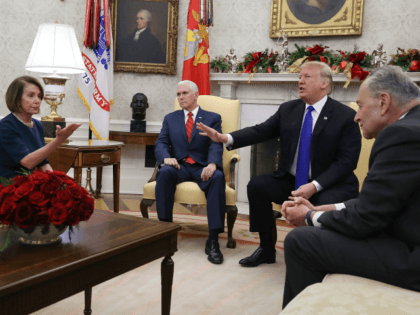 President Donald Trump (2R) argues about border security with Senate Minority Leader Chuck Schumer (D-NY) (R) and House Minority Leader Nancy Pelosi (D-CA) as Vice President Mike Pence sits nearby in the Oval Office on December 11, 2018 in Washington, DC. (Photo by Mark Wilson/Getty Images)