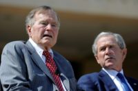 In this April 25, 2013 former US Presidents George H.W. Bush and George W. Bush attend the George W. Bush Presidential Center dedication ceremony in Dallas, Texas