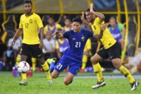 Malaysia and Thailand were held to a 0-0 draw in the AFF Suzuki Cup semi-final in Kuala Lumpur
