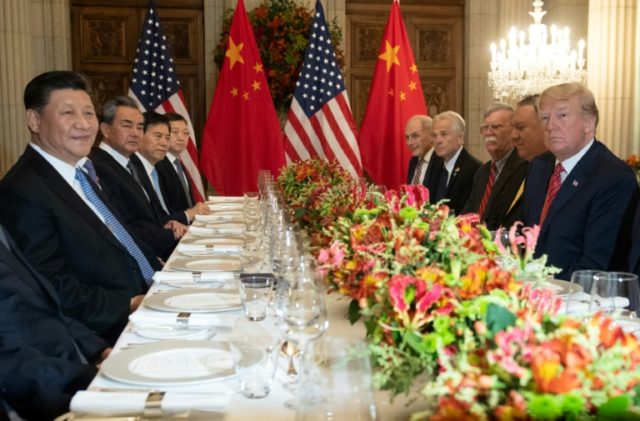 US President Donald Trump (R) Secretary of State Mike Pompeo (2R) and delegation members hold a dinner meeting with China's President Xi Jinping (L) Foreign Affairs Minister Wang Yi (2nd L) and Chinese government representatives after the G20 summit Trump argues tariffs with Xi after tense G20 summit