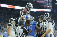 Brandin Cooks of the Los Angeles Rams gets a team celebration after the fourth quarter touchdown during the game against the Detroit Lions at Ford Field on December 2, 2018 in Detroit, Michigan