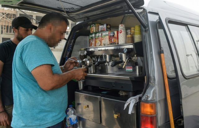 Uprooted Syrians get by with illegal Cairo drinks vans