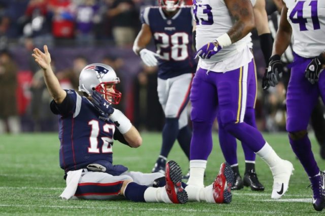 Brady hits 1,000 yards rushing, ties Manning TD record