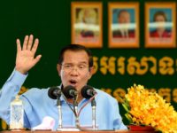 Cambodia's Prime Minister Hun Sen, pictured here in August, has been in power for 33 years using a mix of wily political gambits and networks of alliances in the army and police Cambodia to ease grip on opposition, media as EU threats loom