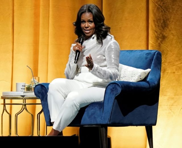 Michelle Obama shelves Paris, Berlin trips for Bush funeral