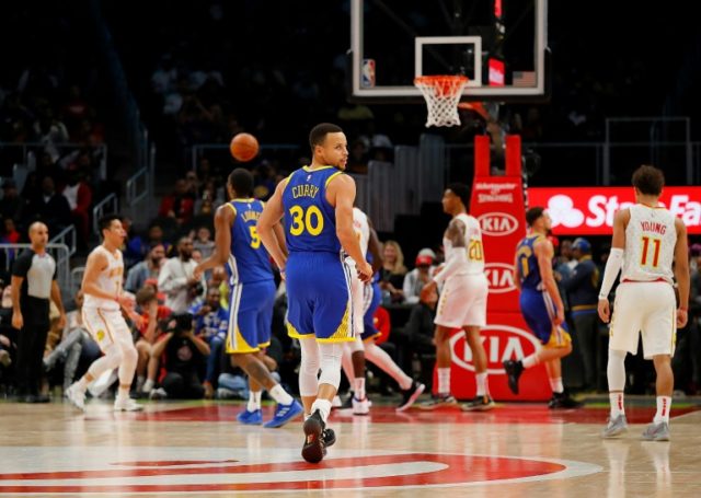 Curry leads charge as Warriors cruise past Hawks