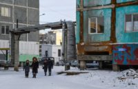 Many houses in Yakutsk are made up of concrete panels and stand on stilts which ensure ventilation of the building's underbelly and prevent it from heating the permafrost, the layer of mineral cemented together with water which is stable as long as it stays frozen. But warmer temperatures are threatening …