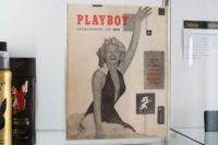 Late Playboy publisher Hugh Hefner's personal copy of the magazine's first issue featuring Marilyn Monroe sold for $31,250, according to Julien's Auctions