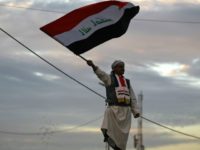 A year after IS defeat, Iraq in throes of political crisis An Iraqi man waves his national flag in Baghdad's Tahrir Square on December 10, 2017, during a gathering celebrating the end of the three-year war against the Islamic State (IS) group