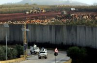 UN peacekeepers patrol the border wall separating Lebanon from Israel on December 9, 2018, after the Israeli army said it had uncovered Hezbollah infiltration tunnels underneath UN peacekeepers patrol the border wall separating Lebanon from Israel on December 9, 2018, after the Israeli army said it had uncovered Hezbollah infiltration tunnels underneath