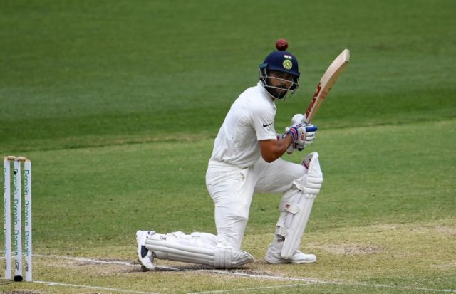 Kohli and Pujara dig in after India lose early wickets