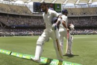 Virat Kohli departs after being dismissed just before lunch for 123in Perth