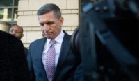 Former National Security Advisor General Michael Flynn leaves after the delay in his sentencing hearing at US District Court in Washington