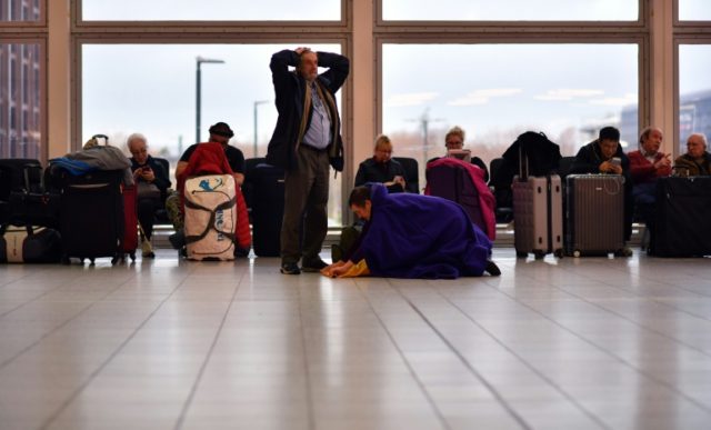 Two held over London airport drone chaos as flights resume